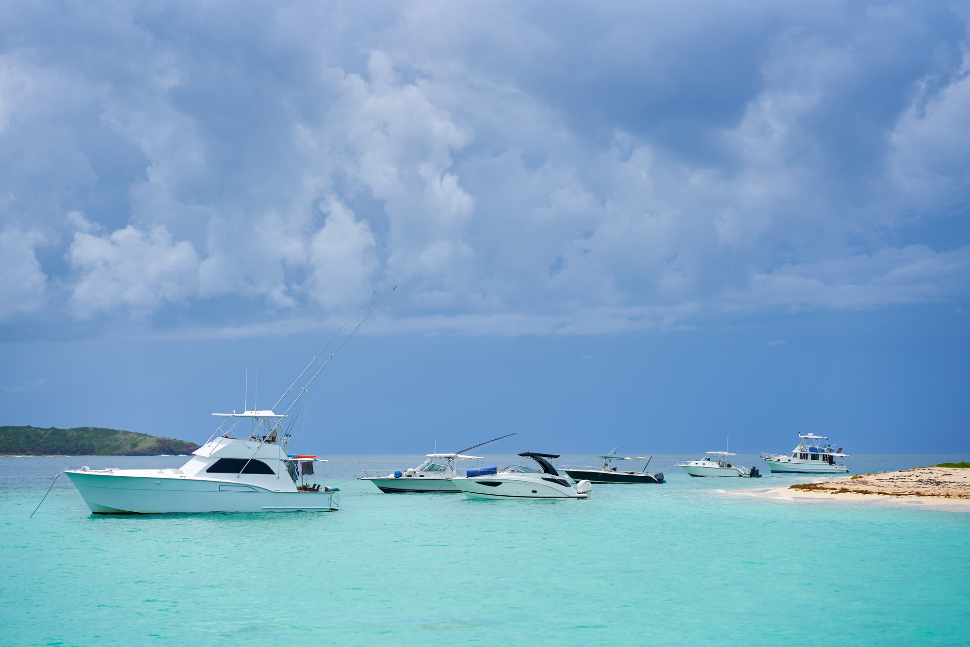 Photo of boats parked by the coast of Cayo Icacos